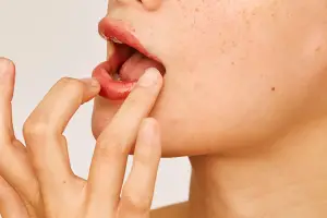 Here’s why you have dry skin around your mouth—here’s what you can do about it